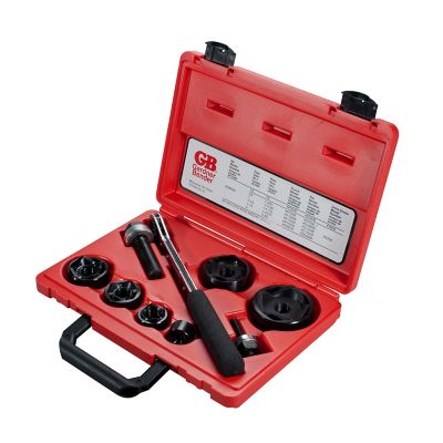 Red case containing knockout punch sets and drivers, with organized compartments and tool specifications visible.