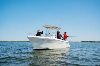 friends fishing on a boat