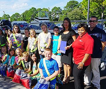BW_2015_Boston-Whaler-Donates-a-Boatload-of-Backpacks-for-the-Fifth-Year_nw