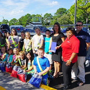 BW_2015_Boston-Whaler-Donates-a-Boatload-of-Backpacks-for-the-Fifth-Year_nw