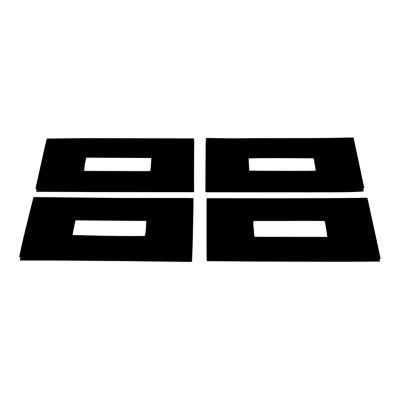 Four black rectangular dampening pads with central cutouts for fifth wheel rails, arranged in a grid pattern.