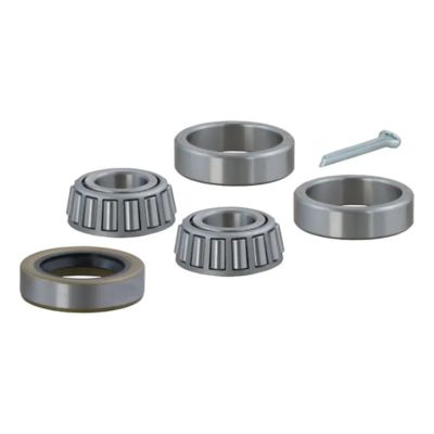 Replacement trailer wheel bearing kit with multiple metal components and nail, designed for durability and easy installation.