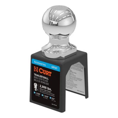 Shiny chrome trailer hitch ball by CURT, labeled 2,000 lbs capacity, displayed in packaging against a white background.