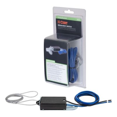 CURT Brakeaway Switch in retail packaging with visible wiring components, designed for enhanced towing safety.