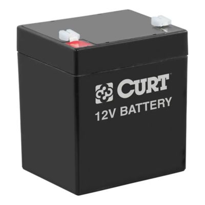 Black CURT 12V trailer breakaway battery with visible branding and compact design.