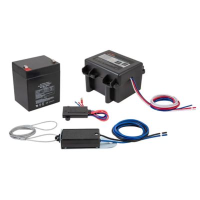 Trailer breakaway switch kit with battery, charger, and cables, ideal for safe towing and emergency braking systems.