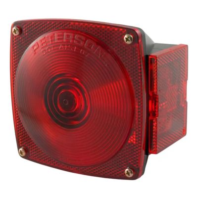 Passenger-side trailer light with a red lens for stop, tail, and turn functions, featuring a square design with clear detailing.