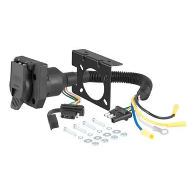 Dual-output trailer wiring adapter with black housing, various connectors, and installation hardware, CURT 57672 model.