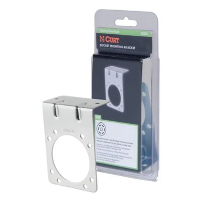 CURT vehicle-side trailer wiring harness bracket for 7-way RV blade, displayed in packaging.