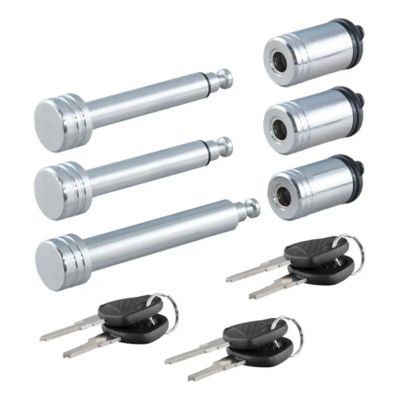 Set of three silver RV tow bar locks with keys, featuring a sleek design for secure towing.