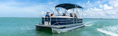 family on pontoon boat