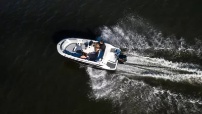 Aerial view of the Element M15 deck boat running