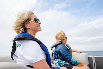 Women On Boat Smiling