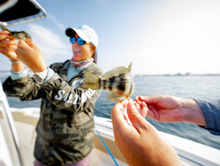 Key West Happy Women Holding Fish
