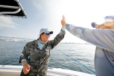 Key West Happy Couple High Five City Background
