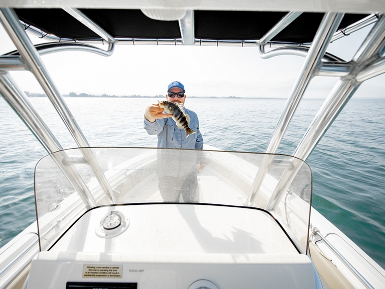Key West Man Holding Fish