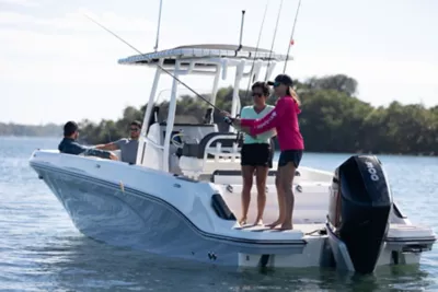 Two People in Bayliner Boat, Running
