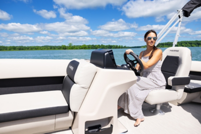 Women driving a Harris Breeze 210 