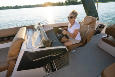 Women driving a Harris Crowne 250.