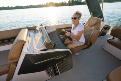 Women driving a Harris Crowne 250 SL.