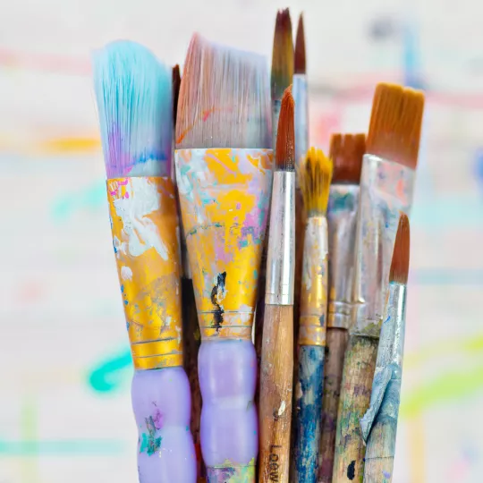 artwork and paint brushes