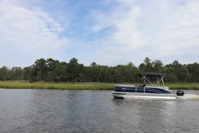 pontoon boating on lewes love creek in delaware