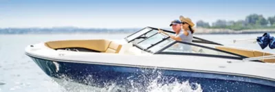 Family on the boat at a sandbar