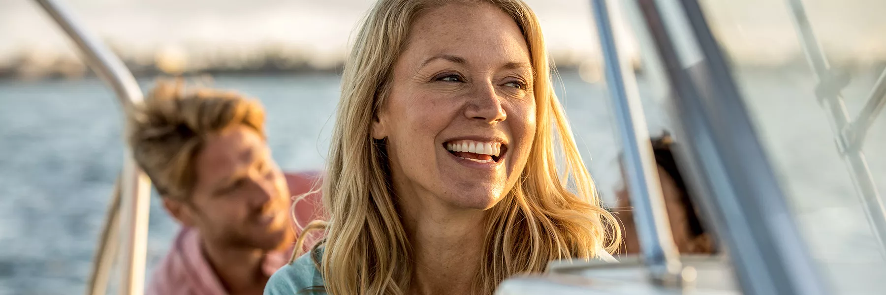 woman smiling on boat