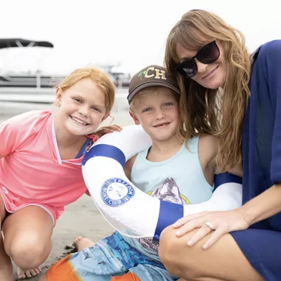 mom and kids at the dock