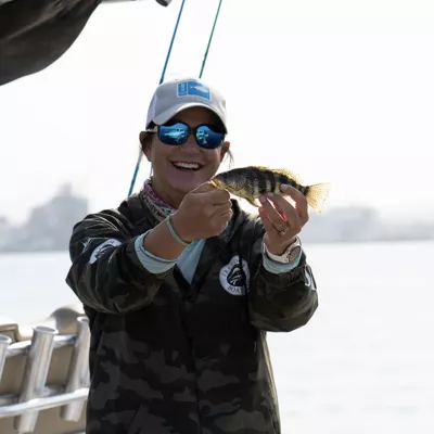 woman caught fish at bowen island