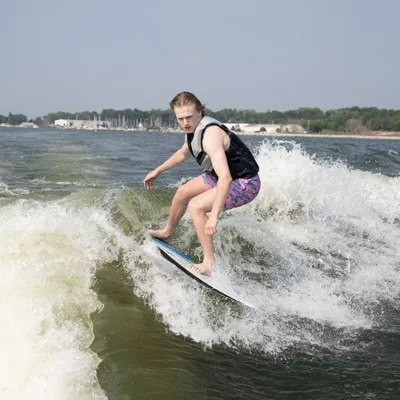 Two girls floating on a tube