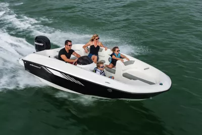 Four Women Riding on Bayliner Deck Boat, Stern View, Boat Underway