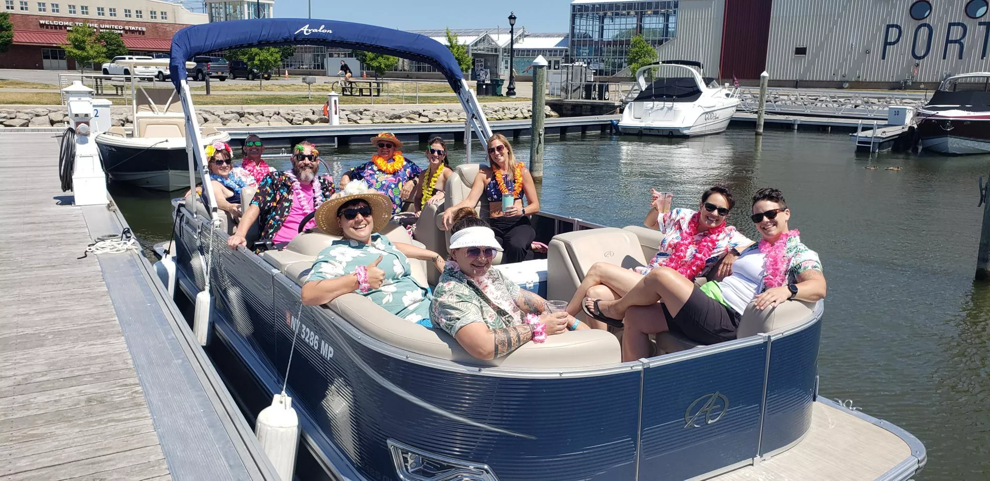 friends on a pontoon at port of rochester