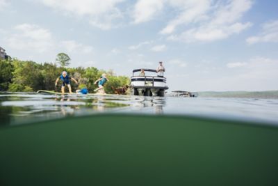Family fishing and hanging out on a Lowe Pontoon
