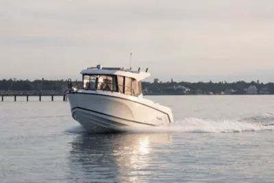 Family of Four Riding on a Bayliner Trophy T20CC Center Console Fishing Boat, Starboard View, Boat Underway