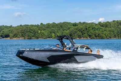 Four Friends Riding on Heyday Wake Boat, Port View, Boat Underway