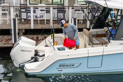 Boston Whaler 330 Vantage Dual Console Fishing Boat Docked at Pier