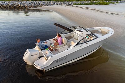 Couple in 210 Vantage Dual Console Boat, Starboard Back View, Boat Anchored