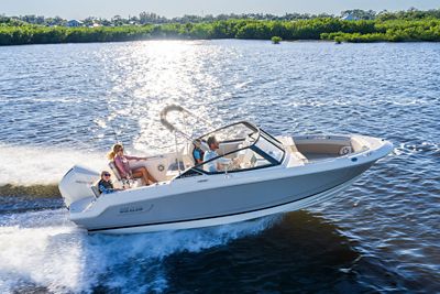 Couple on 210 Vantage Dual Console Boat, Starboard Running View, Boat Underway