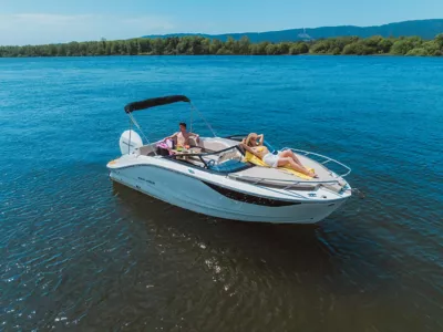 C21 Cuddy Outboard boat on the water