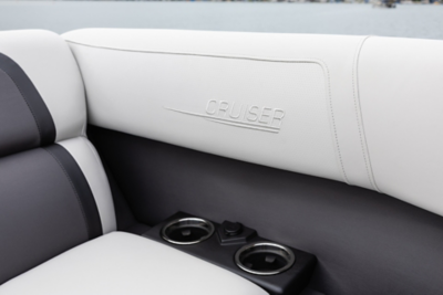 View of the Cruiser interior featuring the logo and cup holders. 