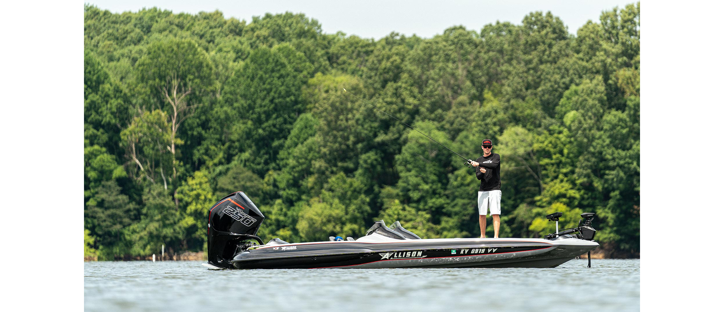 Challenger bass boat - ours has a newer 250 mercury motor and ostrich  seats.