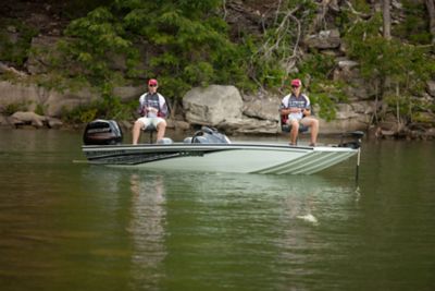 Fisherman Driving Lowe Stinger 198 Aluminum Bass Boat on Lake, Stern View