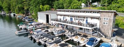 Boats docked on water in Lake George.