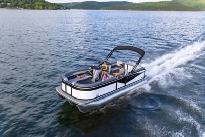 Family riding on Lowe LS Pontoon, Boat Underway