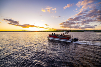 Family riding along in a Lowe RS 250 DL Pontoon Boat