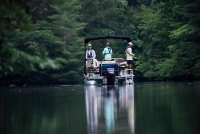 Friends fishing off a Lowe Pontoon