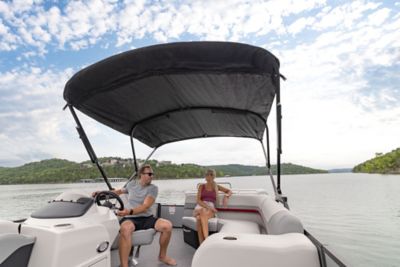 Two Couples on Lowe Pontoon Boat with Mercury Engine, Port-Stern View, Boat Underway