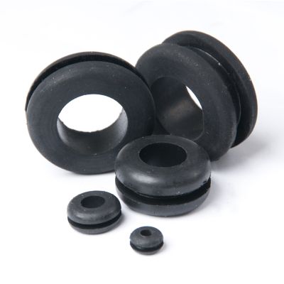 Rubber grommets in various sizes for hoses and clamps, displayed on a plain background.