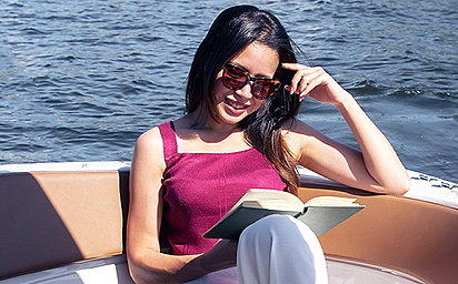 woman-reading-boat